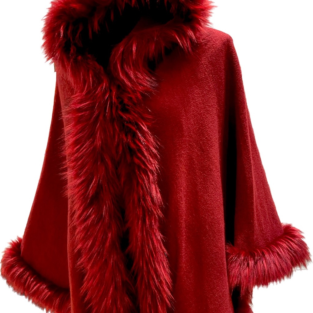 Beautiful faux fur cape with sleeve hole and hood.